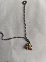bracelet argent avec pendentif ours couleur. 
