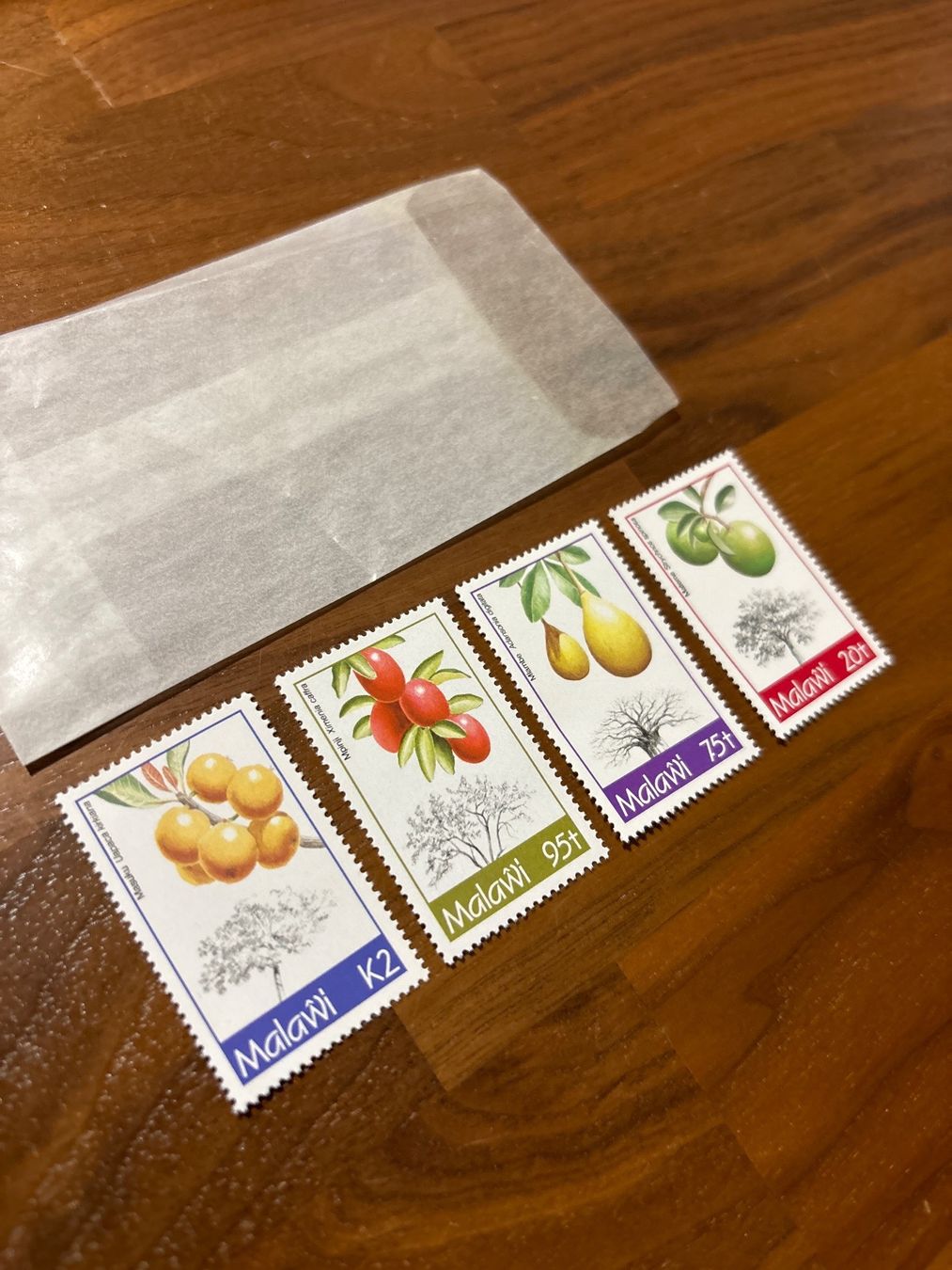 Tutti i francobolli: Briefmarken Malawi Früchte – Nuovo e nell'imballaggio originale da Zürich venduto da engebrunau