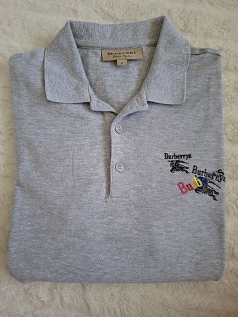 Polo Burberry gris taille M 