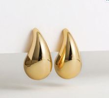 Elegante goldene Ohrringe in Tropfenform, neuwertig!