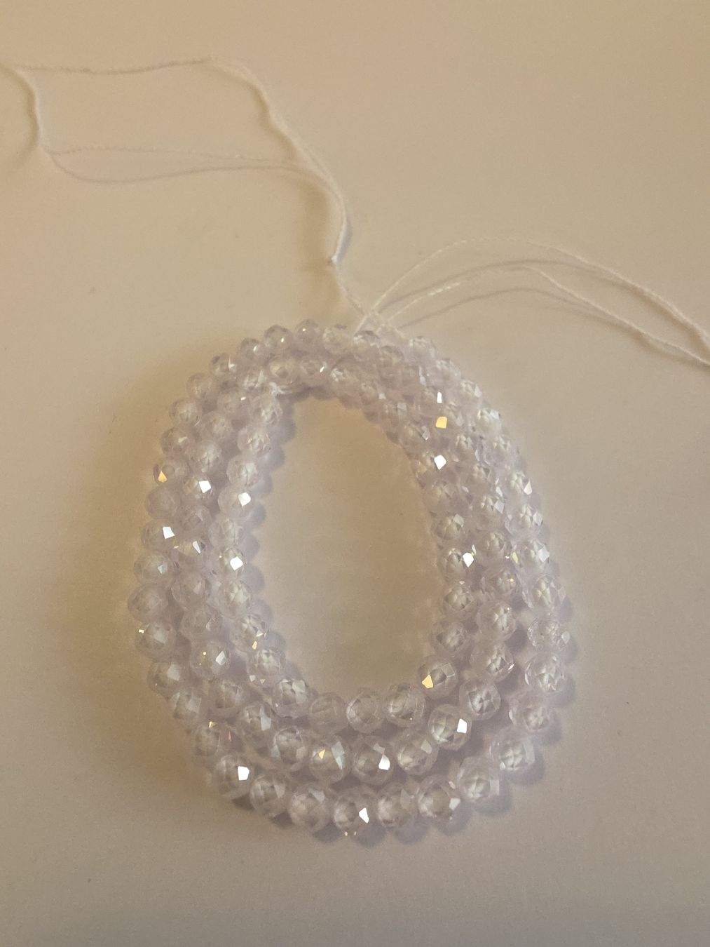 Mineralien & Heilsteine: Zirkon Weiss facettiert 4mm. Strang – Neu und originalverpackt aus Menziken von Mirager 2