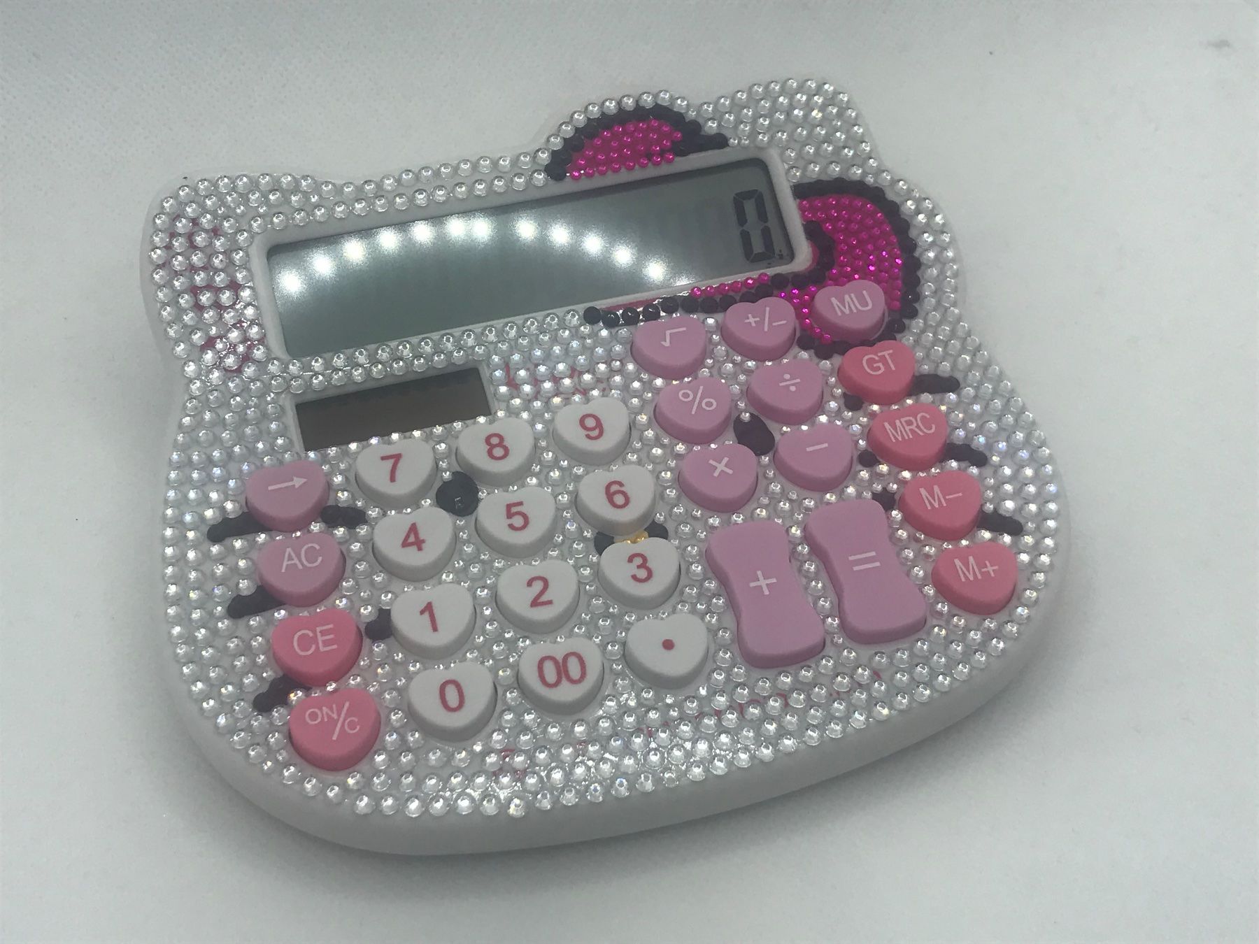 Calcolatrici tascabili: Hello Kitty Rechner, pink, Glitzersteine, neu – Nuovo e nell'imballaggio originale da Niederteufen venduto da mix18