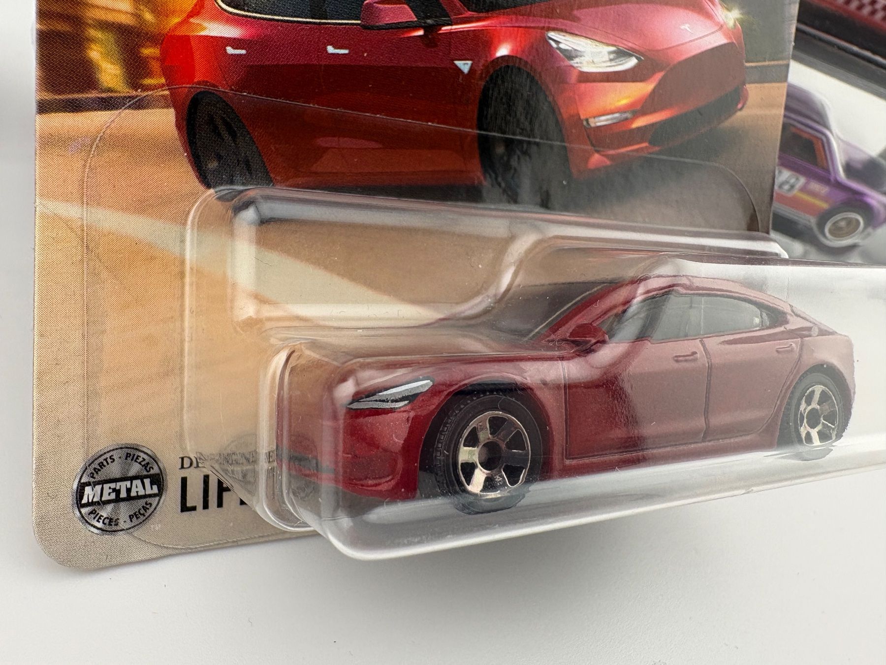 Matchbox Modellini d'auto: Matchbox Tesla Model 3 - 2024 - 4/125 – Nuovo e nell'imballaggio originale da Flawil venduto da HeisseReifen 2