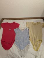 drei Baby Bodys