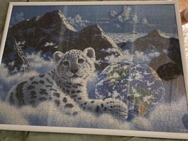 Puzzle Schneeleopard mit Erde 1000 Teile guter Zustand