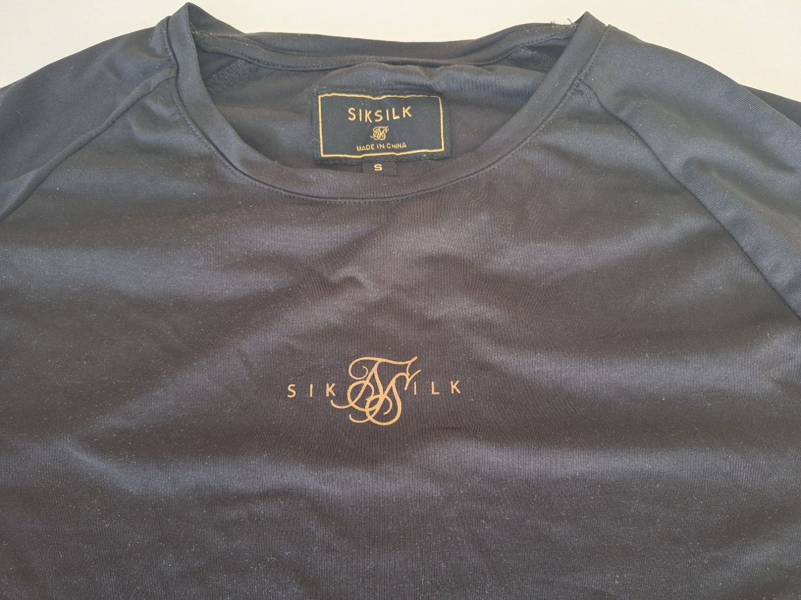 Siksilk T-shirt: T-shirt SikSilk noir, taille S – Usato da Missy venduto da Heli1565 1
