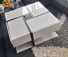 Table basse design moderne, 4 tiroirs, blanc/noir, bon état