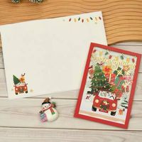 Filigrane Weihnachtskarte mit farbigem Umschlag