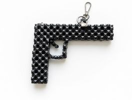 Edgy Studded Gun Keychain - Statement Piece Accessory