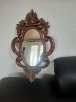 Beau Miroir en bois sculpté 