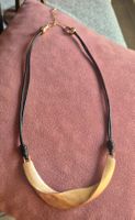 Collana donna metallo color oro e cordino nero