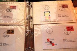 Green album with 76 FDC and letters from switzerland