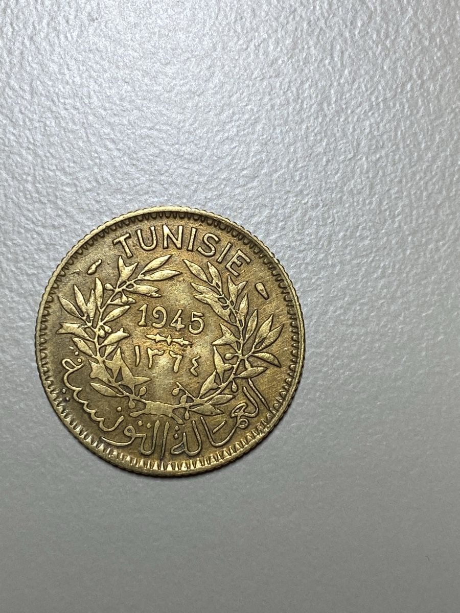 Tutti le monete: Tunisie - 1 franc - 1945 – Usato da Payerne venduto da Mike1682