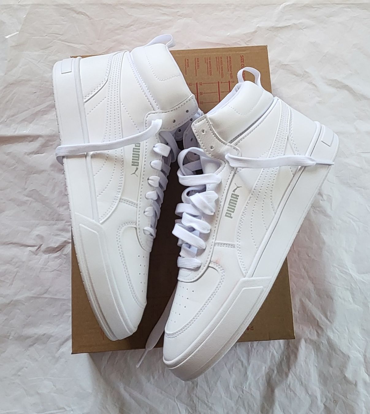 Puma Scarpe da uomo: Puma Caven Mid, blanches, taille 42.5, état  neuf – Nuovo (secondo la descrizione) da Niedergösgen venduto da Eva2410 6