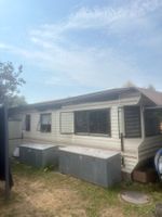 Mobile-home avec auvent