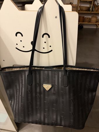 Maison Mollerus Tasche schwarz mit goldigen elementen