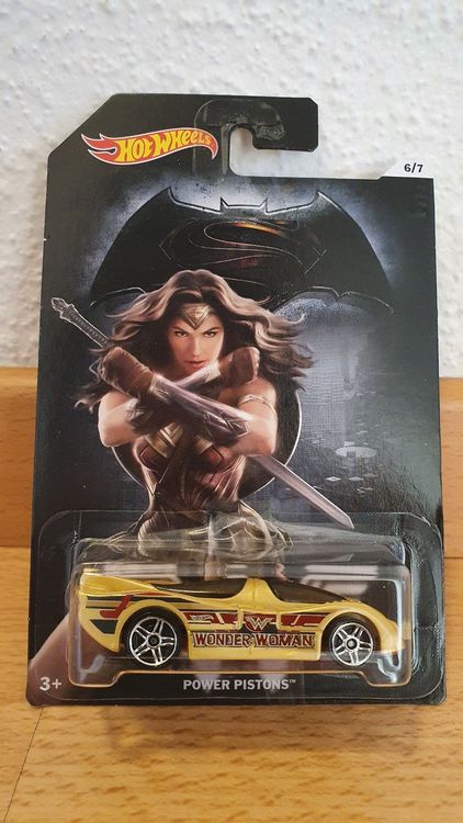 Hot Wheels Power Pistons Die-Cast Car - Wonder Woman Edition, 1:64 Scale, With Flashing Light (Gold)