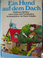 ein hund auf dem dach