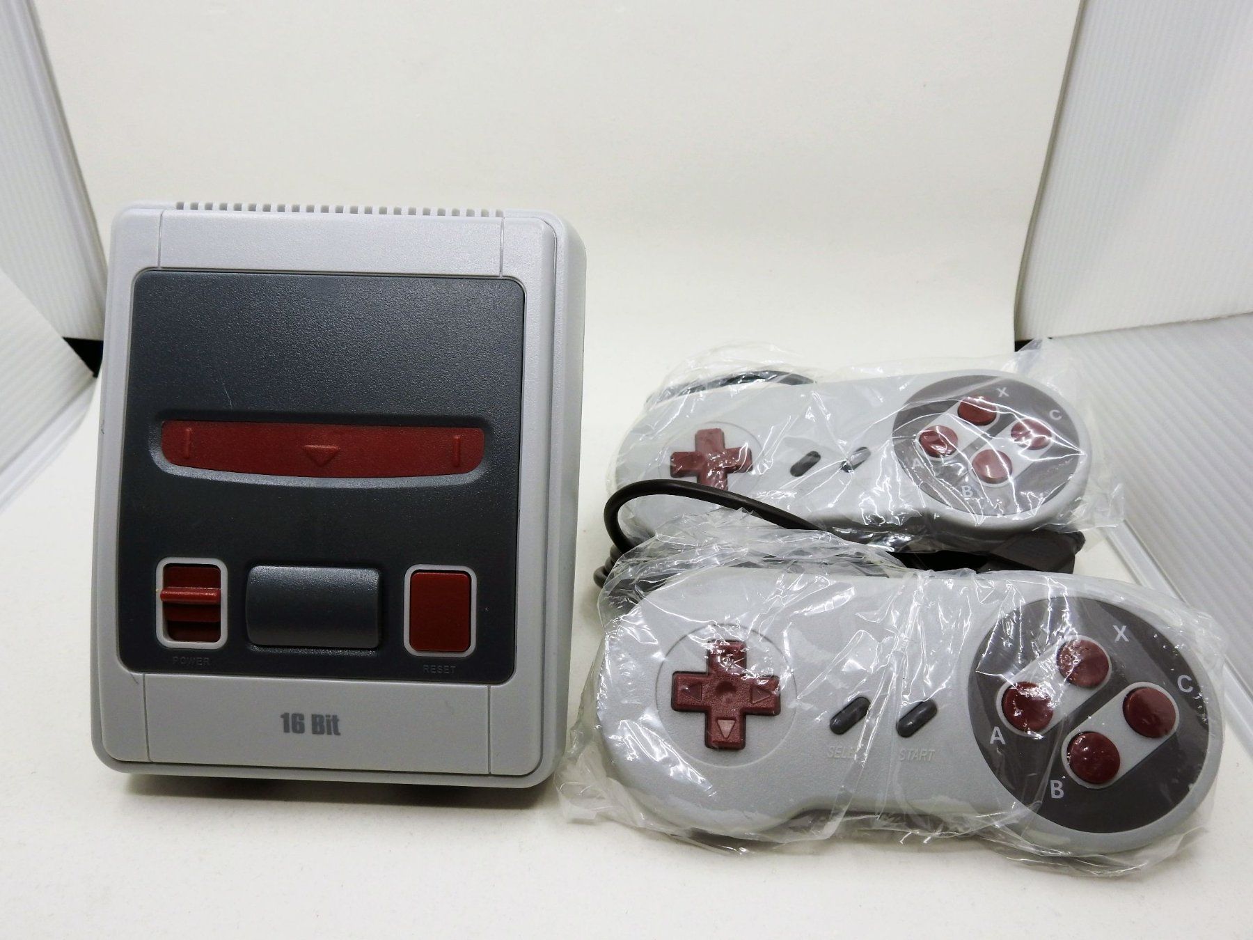 Console: Retro Spielkonsole 16 Bit Mini 167, mit 2 Controller & Case – Usato da Zürich venduto da Numark