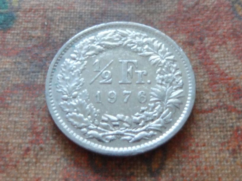 Tutti le monete: 1/2 Fr. 1976 – Usato da Romanel-sur-Lausanne venduto da Swift13