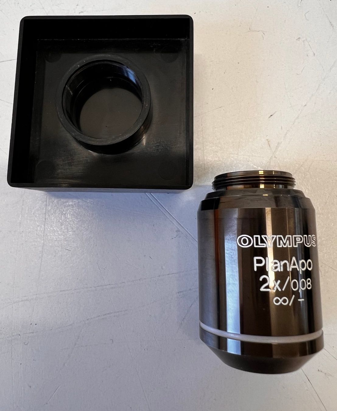 Olympus Microscopi: Olympus Microscope Lens UPlanApo 2x/0.08, ∞/- – Usato da Niederdorf venduto da LeptonAG_Labor 2