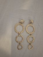 Paire de boucles d'oreilles pendantes dorées cercles