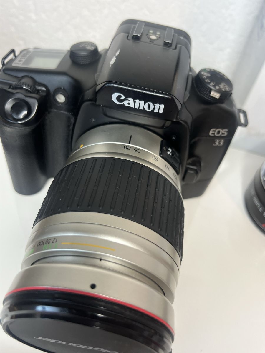 Canon Fotocamera: Canon EOS 33 argentique avec objectifs Voigtländer – Usato da Ipsach venduto da Worrior23 1