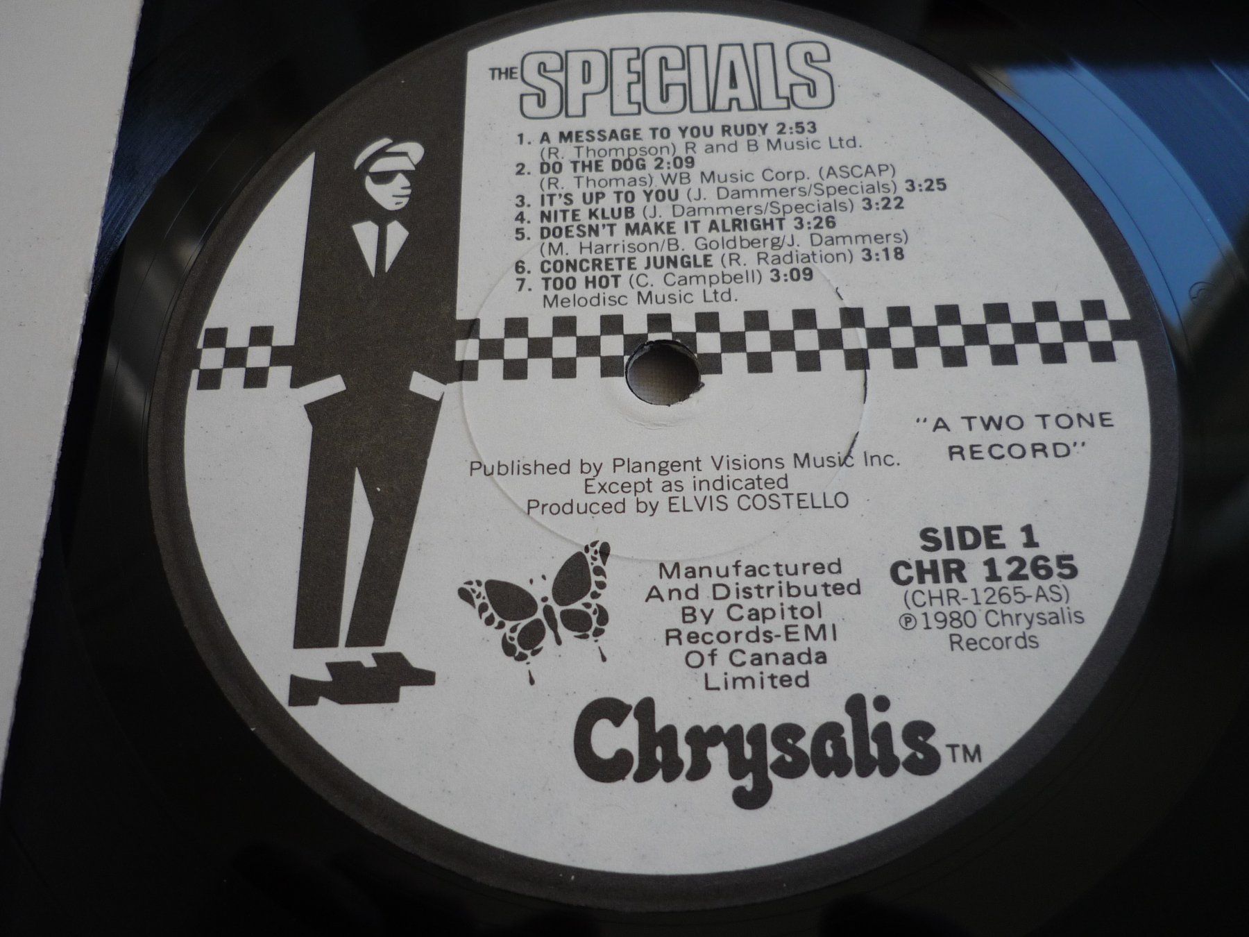 Dischi in vinile: 1x 12" Schallplatte - The Specials - Chrysalis - canada – Usato da Beringen venduto da Flatretriever 2