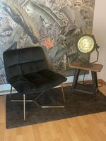 Stylischer Sessel in Dunkelgrün