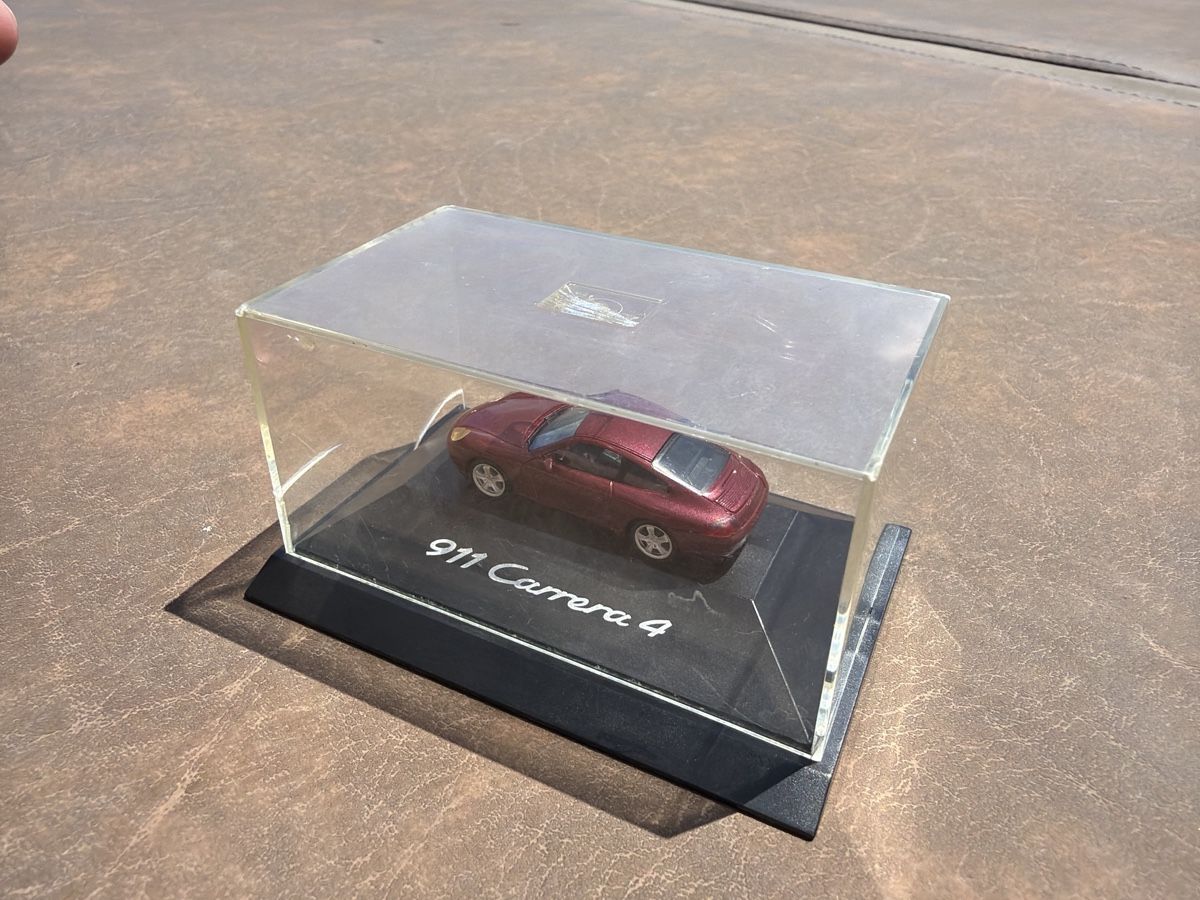 Porsche Modellini d'auto: Porsche 996 Carrera 4 - 1/87 – Usato da Wolfwil venduto da Rolex1 5