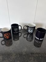 4 Kaffeetassen Set schwarz diverse Motive gebrauchter Zustan