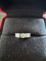 Cartier, bague or blanc 750 avec diamant 0.33 carat