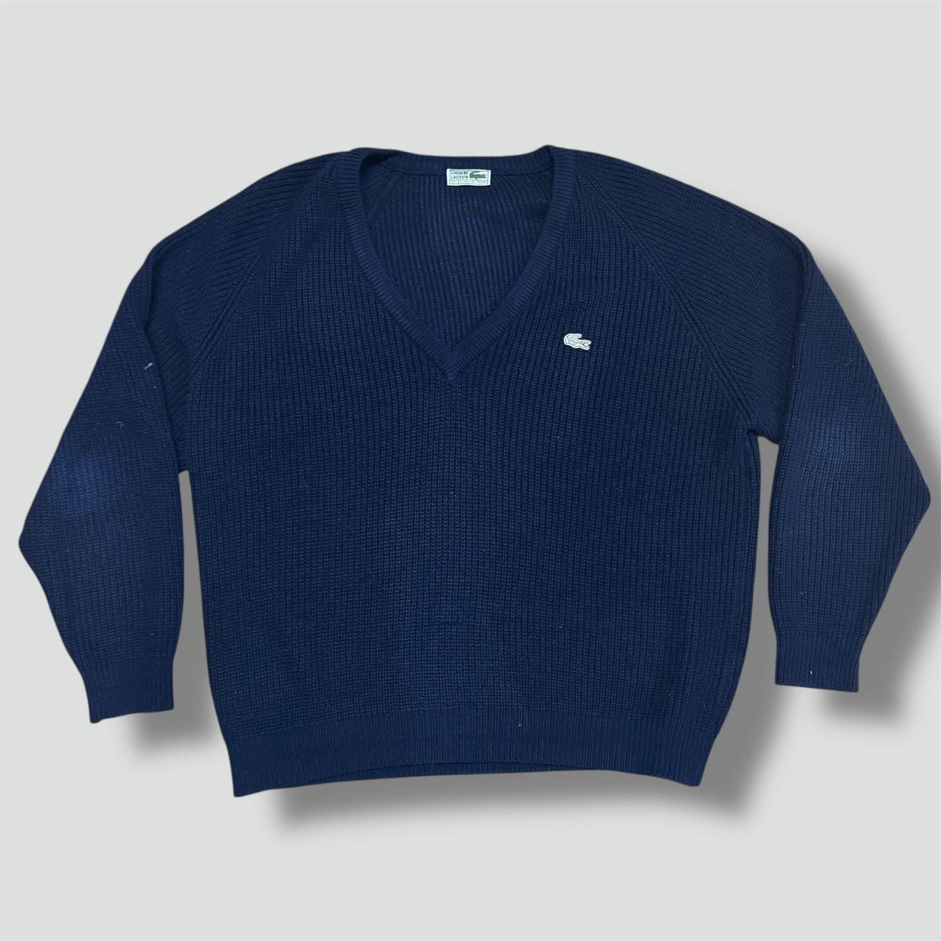 Lacoste Maglioni & Felpe: Lacoste vintage knitted v-neck sweatshirt 90s strickpullover – Usato da St. Gallen venduto da sourced_limited