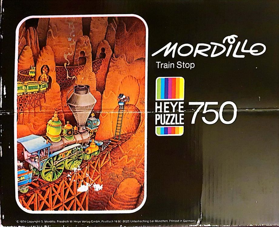Mini Puzzle HEYE 48 Pièces - Mordillo (Train Toile D'Araignée) 16x10cm