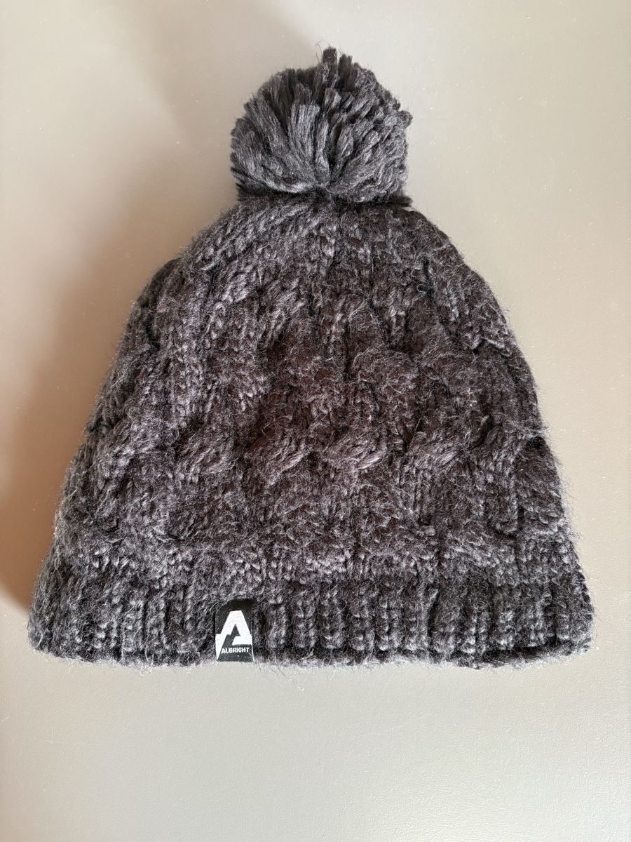 Albright Copricapi, berretti & cappellini: Warme Wintermütze mit Bommel, ALBRIGHT, schwarz – Usato da Güttingen venduto da norwis3