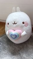 Peluche Molang géante avec coeur, parfaite pour câlins!