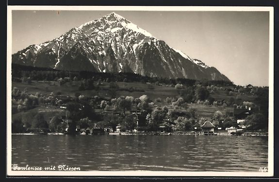 Cartoline postali: AK Faulensee, Ortsansicht mit Niesen – Usato da Berlin venduto da bartko-reher