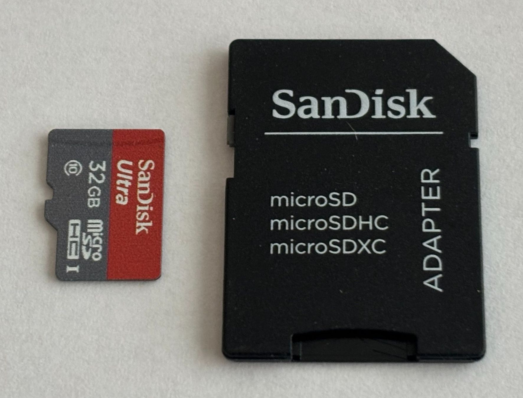 Sandisk Cartes mémoire: SanDisk Ultra microSDHC 32GB + SD‑Adapter – D'occasion à Bassersdorf par Antaris01