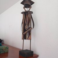 Gratuliere zum Diplom mit einer Kupferfigur!