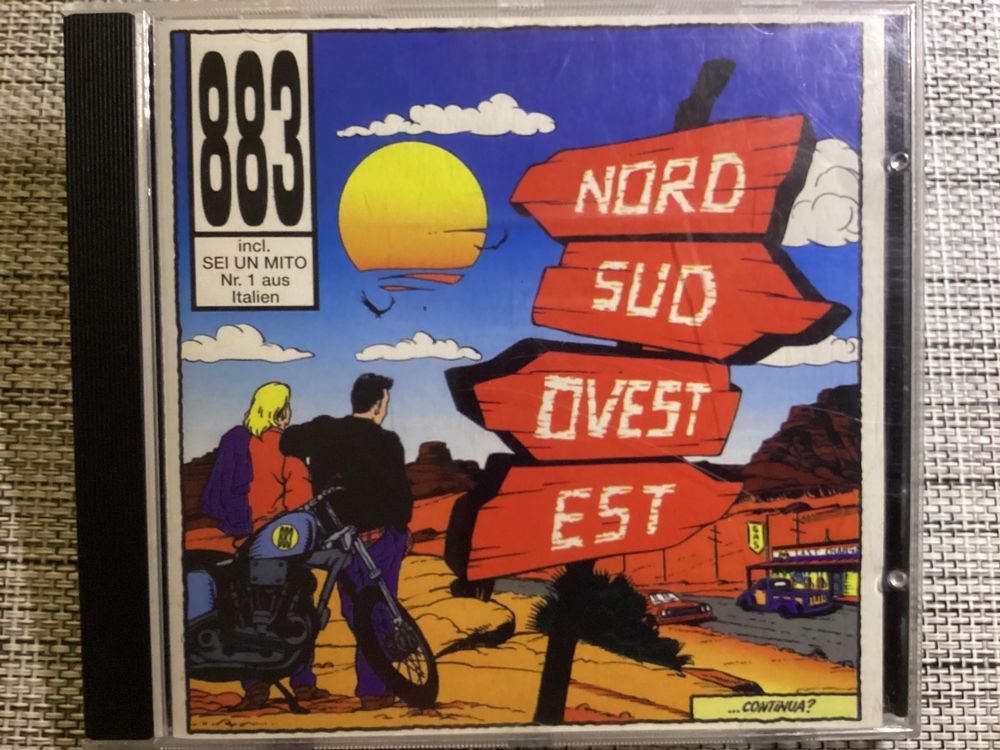 CD 883 – Nord Sud Ovest Est
