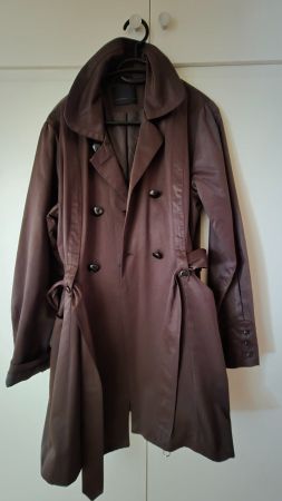 Manteau de pluie ( porté 1x) correspond à une taille 42/44