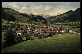 AK Zweisimmen, Ortsansicht mit Kirche und Bergpanorama