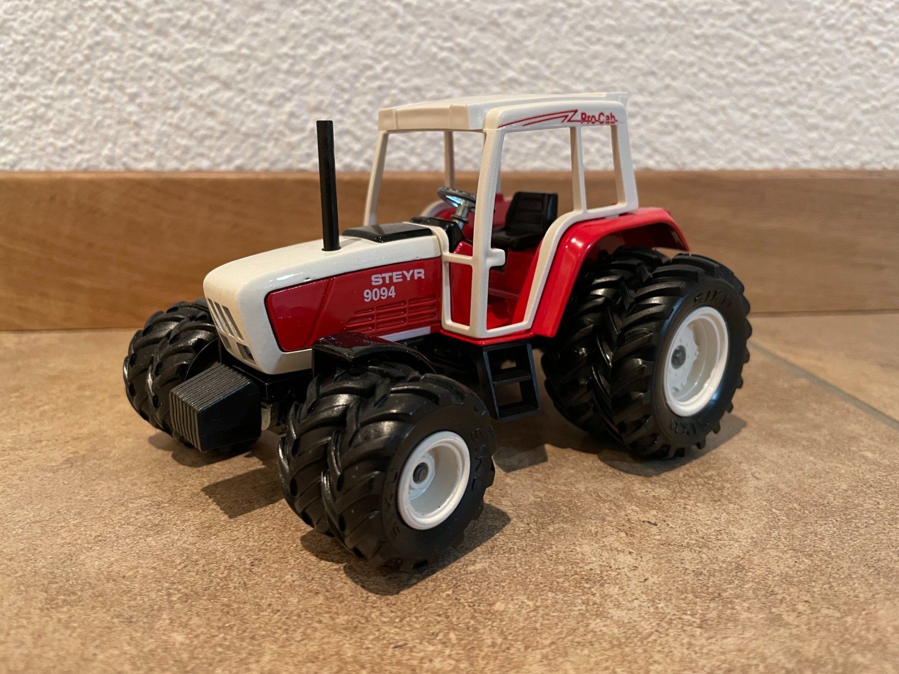 Steyr Trattori: SIKU Steyr 9094 – Nuovo e nell'imballaggio originale da Kreuzlingen venduto da Stefan1150