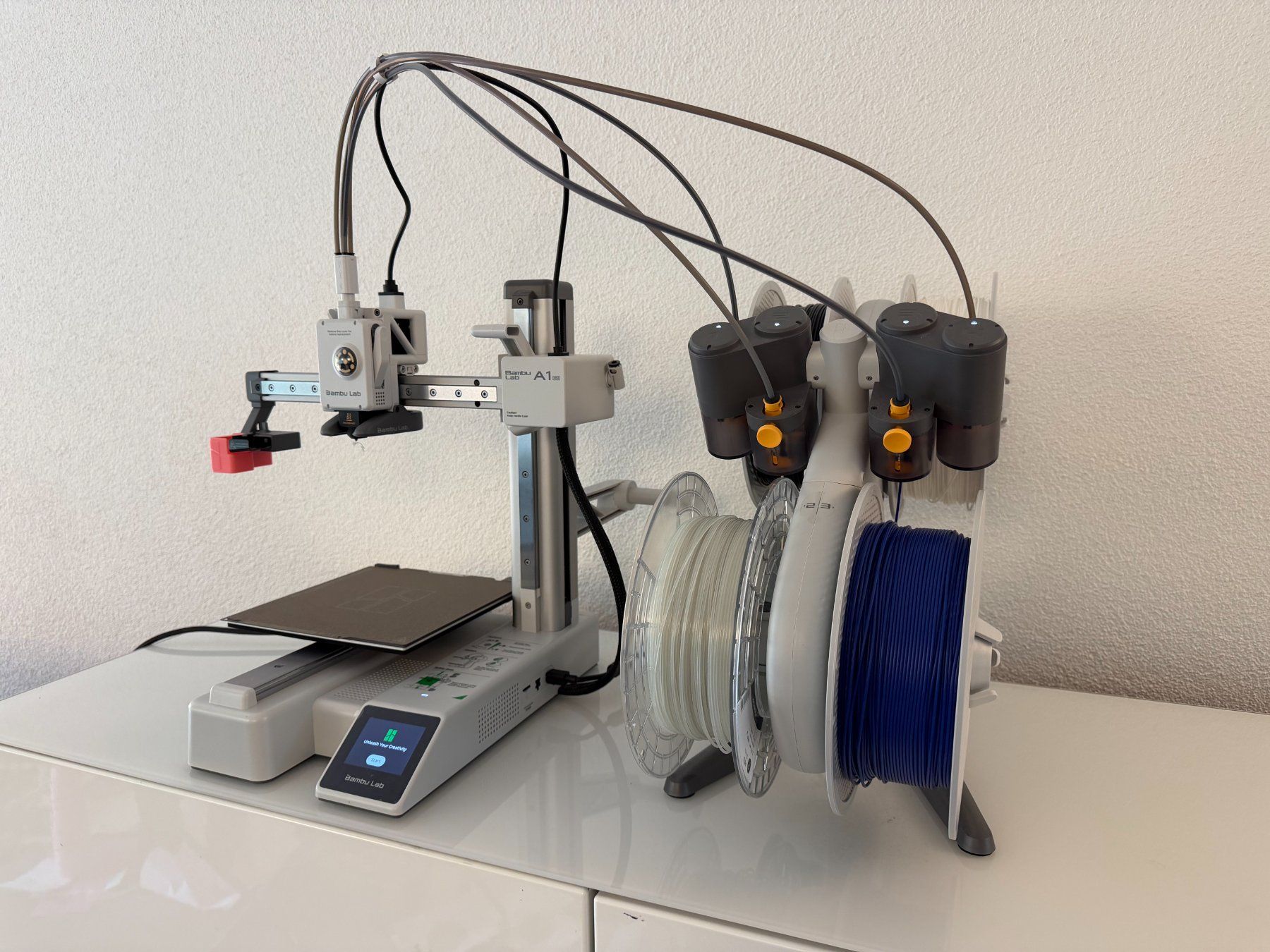 Bambu Lab 3D Drucker: Bambu Lab A1 mini Combo mit AMS lite & 12 Filamentrollen – Gebraucht aus Cham von fucad 6