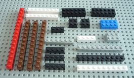 Lego Bausteine (rot, braun, schwarz, weiss, grau, blau)