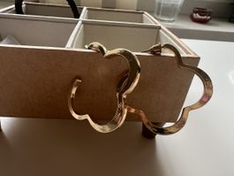 Trendy Gold Clover Hoop Earrings -  Chic!