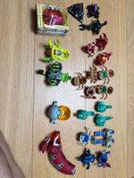 Lot Bakugan Battle Brawlers — ~25 figurines + launcher + tra