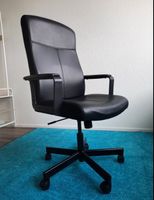 Schwarzer Drehstuhl aus Leder