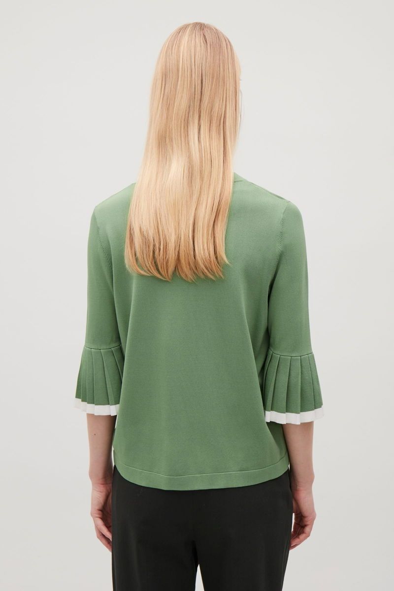 Cos Top: COS Pullover grün mit Plisseearmeln Grösse M – Usato da Siebnen venduto da koschitoschi 2