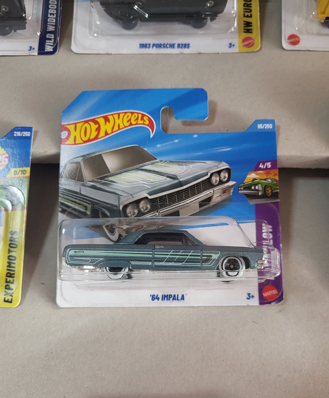 Hot Wheels Modellini d'auto: Hot Wheels '64 Impala – Nuovo e nell'imballaggio originale da Zürich venduto da MDC0